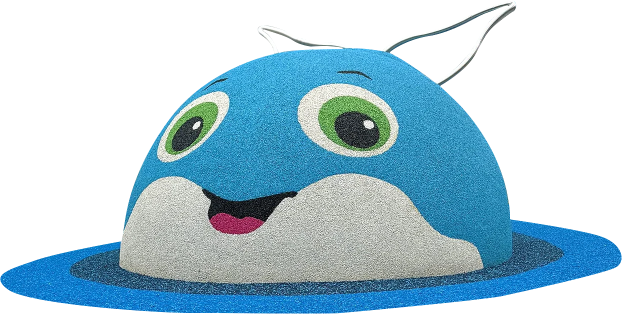 A blue, dome-shaped playground structure with large green eyes, a smiling mouth, and two fin-like ears on top.